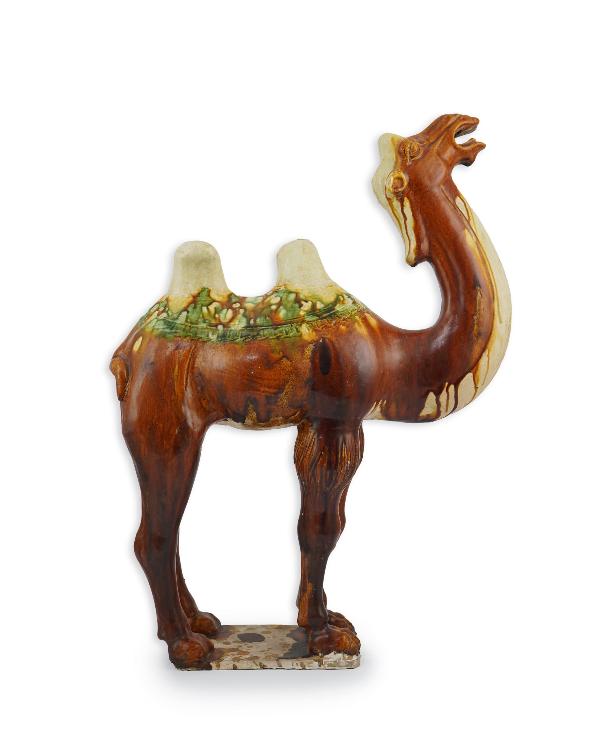 A large Chinese sancai pottery figure of a bactrian camel, Tang dynasty
